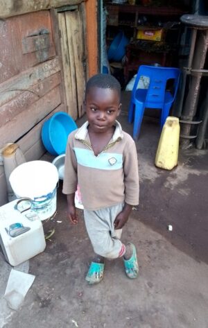 Emmanuel, age seven, waiting for a sponsor